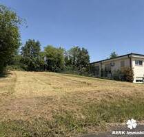 BERK Immobilien - Seltene Gelegenheit: Bauplatz mit zusätzlicher Freifläche in Aschaffenburg-Strietwald