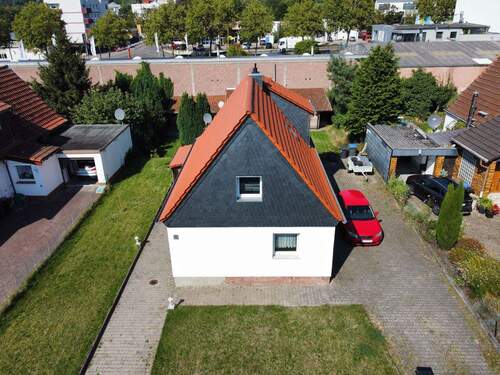 Ansicht mit Anbau - 4 Zimmer Einfamilienhaus zum Kaufen in Kaiserslautern