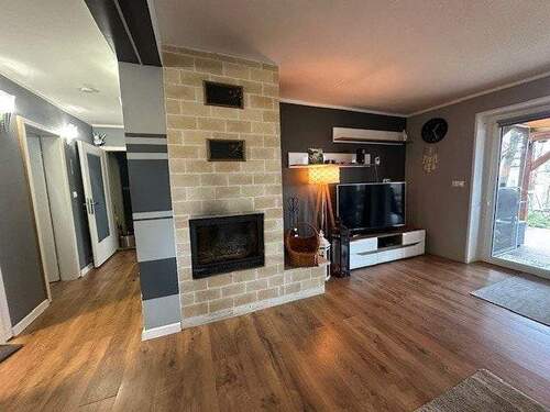 Wohnzimmer mit Kachelofen - 