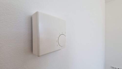 Raumthermostat für die Fußbodenheizung - 