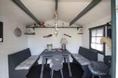 Das Gartenhaus mit Sitzbereich - 
