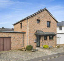 Freistehendes Einfamilienhaus mit gepflegtem Garten und Garage in ruhiger Wohnlage in Kohlscheid - Herzogenrath