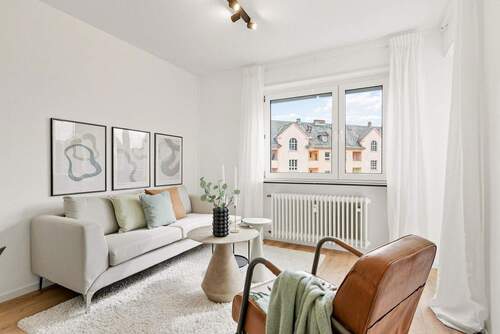 Wohnzimmer - 2 Zimmer Etagenwohnung zum Kaufen in Ludwigshafen am Rhein