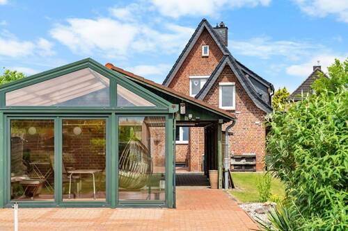 Rückansicht - Ein Haus zum Ankommen - gepflegtes Zuhause mit traumhaftem Garten
