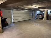 Tiefgarage nebst Stellplatz - 