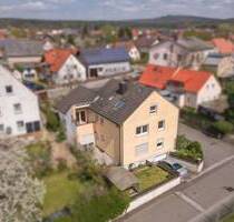 Attraktives Dreiparteienhaus mit großzügigem Grundstück in Oberhaid