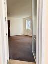 Blick vom Balkon ins Wohnzimmer - 