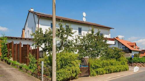 Außenansicht 2 - 1 Zimmer Mehrfamilienhaus, Wohnhaus zum Kaufen in Gau-Bischofsheim