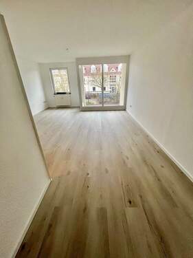 Wohnzimmer - Etagenwohnung mit 76,90 m&sup2; in Ronnenberg zur Miete