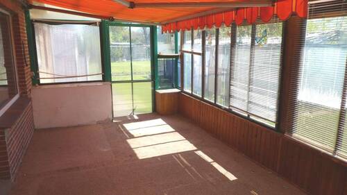 Überdachte Veranda bei Wohnzimmer - 