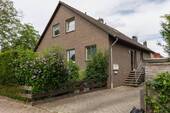 Hausansicht - 5 Zimmer Mehrfamilienhaus, Wohnhaus zum Kaufen in Wunstorf