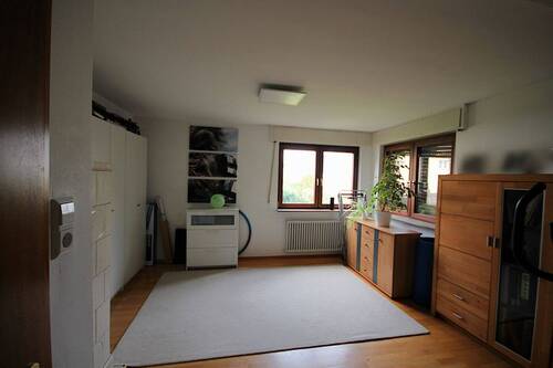 Wohnzimmer - 6 Zimmer Einfamilienhaus zum Kaufen in Rheinstetten
