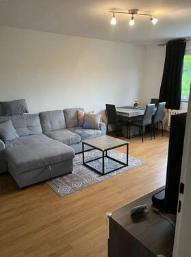 Wohnzimmer (Vormieter) - 2-Zimmer-Wohnung im 5. Obergeschoss mit West-Loggia