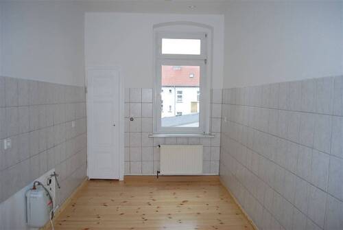 Küche mit aufgearbeiteten Dielen - 