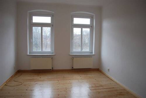 Zimmer mit aufgearbeiteten Dielen - 
