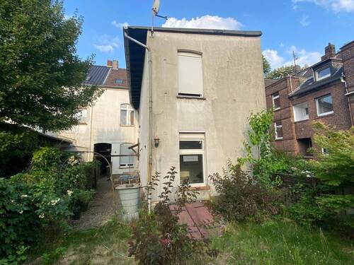 Rückansicht des Hauses - Mehrfamilienhaus, Wohnhaus mit 207,00 m&sup2; in Duisburg zum Kaufen
