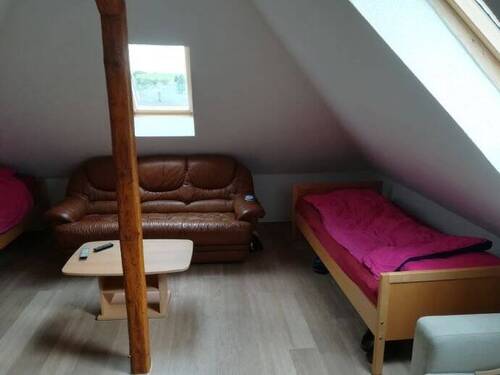 Wohnzimmer im ausgebautem Dachgeschoss - 