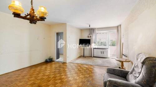 Wohnzimmer 1 - Etagenwohnung mit 75,00 m² in München zum Kaufen