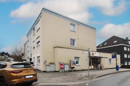 02_Seitenansicht Haus - 2 Zimmer Etagenwohnung zum Kaufen in Essen