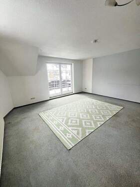 Wohnzimmer - Etagenwohnung mit 74,80 m&sup2; in Stuhr zum Kaufen