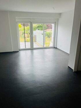 Wohnzimmer - Perfekt für den Start: Reihenhaus mit Garten & 3 Schlafzimmern. Sofort bezugsfertig !