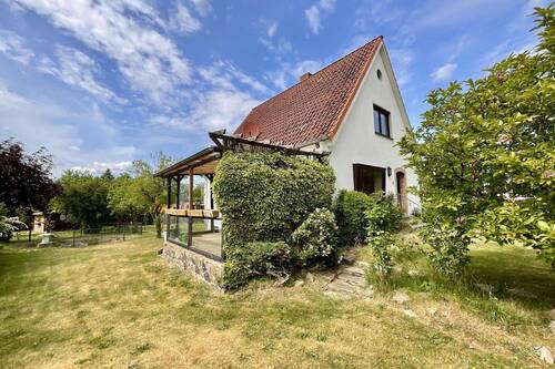 Gartenansicht - 4 Zimmer Einfamilienhaus zum Kaufen in Lübeck