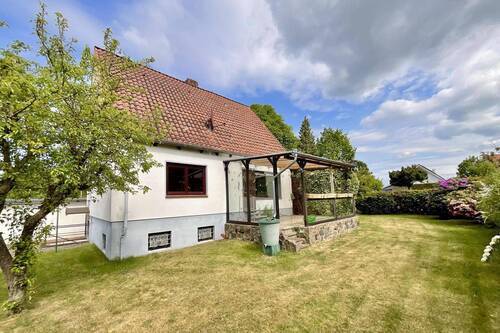 Gartenansicht - Einfamilienhaus mit 104,00 m&sup2; in Lübeck zum Kaufen