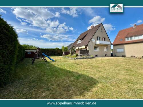 Außenansicht - Ideal für Familien: Ein-Zweifamilienhaus mit großem Garten