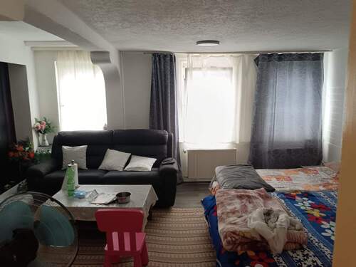 Wohnzimmer - 1 Zimmer Mehrfamilienhaus, Wohnhaus zum Kaufen in Nürtingen