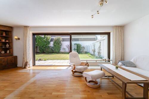 Wohnzimmer - Doppelhaushälfte mit 155,00 m² in München zum Kaufen