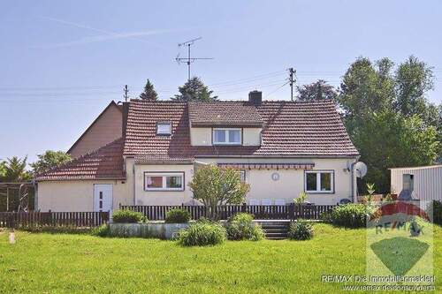 Gartenansicht - Gemütliches Einfamilienhaus mit großem GartenBaugrundstück