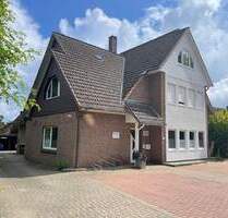 Mehrfamilienhaus mit 3 Wohnungen und Gewerberäumen in Erdgeschoss - Munster