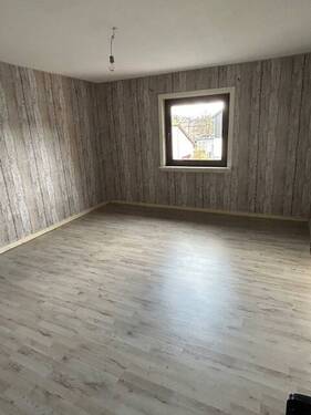 Wohnzimmer - Mehrfamilienhaus, Wohnhaus mit 140,00 m&sup2; in Driedorf zum Kaufen