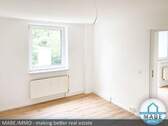 Schlafzimmer Musterwohnung - [BALKON] Freu dich auf deine neue 2-Raum-Wohnung!