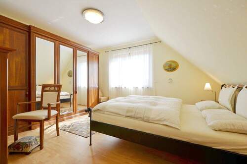 Blick in das Schlafzimmer - Etagenwohnung mit 84,00 m² in Graal-Müritz zum Kaufen
