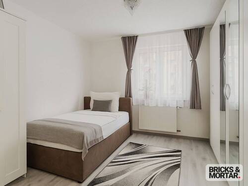 Schlafzimmer (Einrichtung mit KI verändert) - 2 Zimmer Etagenwohnung in Augsburg / Haunstetten