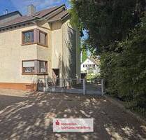 Mehrfamilienhaus in absoluter Bestlage von Hockenheim nähe ehem. Gartenschaugelände mit 2 Garagen