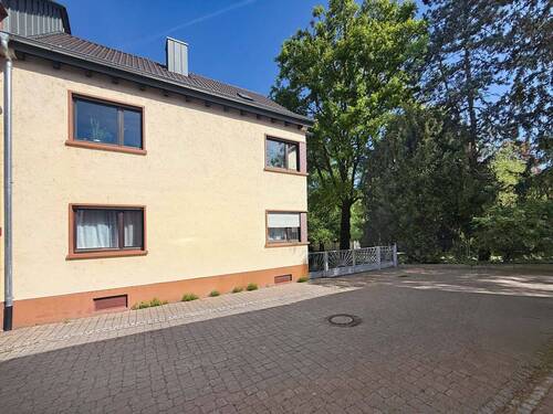 Vorderansicht - 7 Zimmer Mehrfamilienhaus, Wohnhaus zum Kaufen in Hockenheim