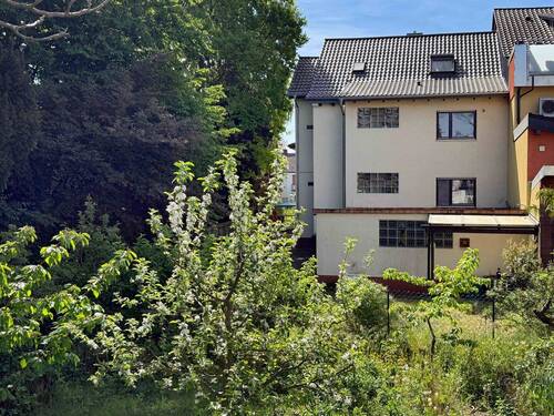 Rückansicht - Mehrfamilienhaus, Wohnhaus mit 192,00 m&sup2; in Hockenheim zum Kaufen