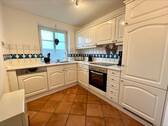 Küche mit Einbauküche - Reihenmittelhaus mit 74,00 m&sup2; in Nordstrand zum Kaufen