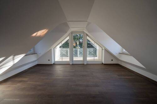 Wohnzimmer - Etagenwohnung mit 85,30 m² in Unterhaching zum Kaufen