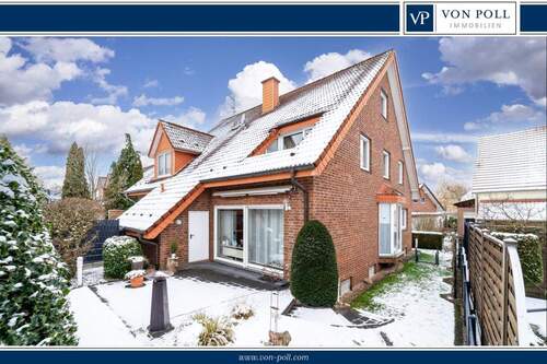 Titelbild - Großzügige Doppelhaushälfte mit Doppelgarage in zentraler Lage von Halle (Westf.)