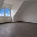 Wohnzimmer - Moderne 2-Zimmer Dachgeschosswohnung