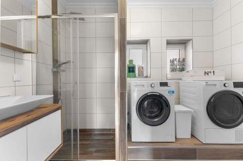 Badezimmer EG - Doppelhaushälfte mit 123,60 m&sup2; in Greetsiel zum Kaufen