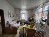 Wohnzimmer EG rechts - 2 Zimmer Mehrfamilienhaus, Wohnhaus in Börßum