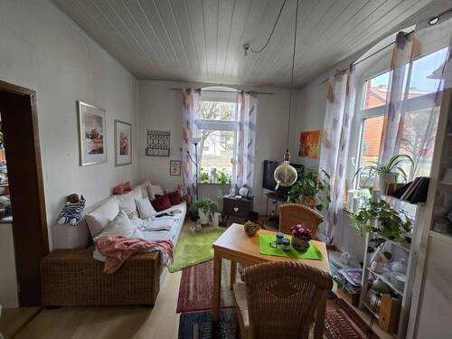Wohnzimmer EG rechts - 2 Zimmer Mehrfamilienhaus, Wohnhaus in Börßum