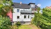 Außenansicht 2 - Gepflegtes Reihenhaus mit 3 Zimmern, Einbauküche, Vollkeller, Garten und überdachter Terrasse