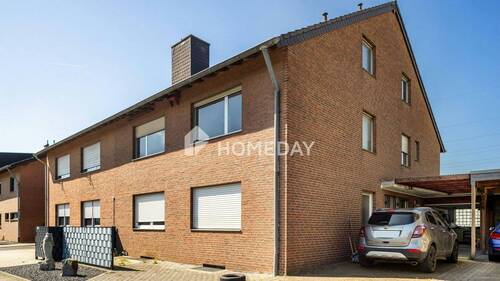 Außenansicht 1 - Geräumiges ZFH mit Garten, Balkon, Loggia, Garage und Ausbaupotenzial in ruhiger Lage