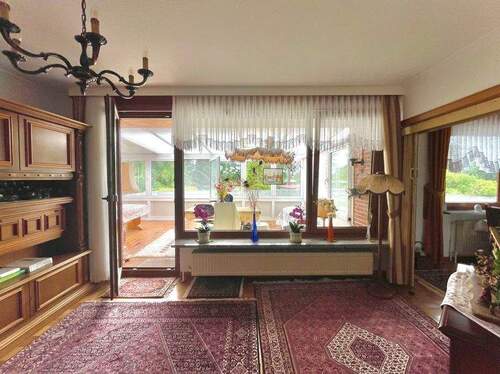 Haus 1 - Wohnzimmer mit Wintergarten - 