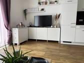 Wohnbereich mit TV-Anschluss - Etagenwohnung mit 49,40 m&sup2; in Rottenburg an der Laaber zur Miete